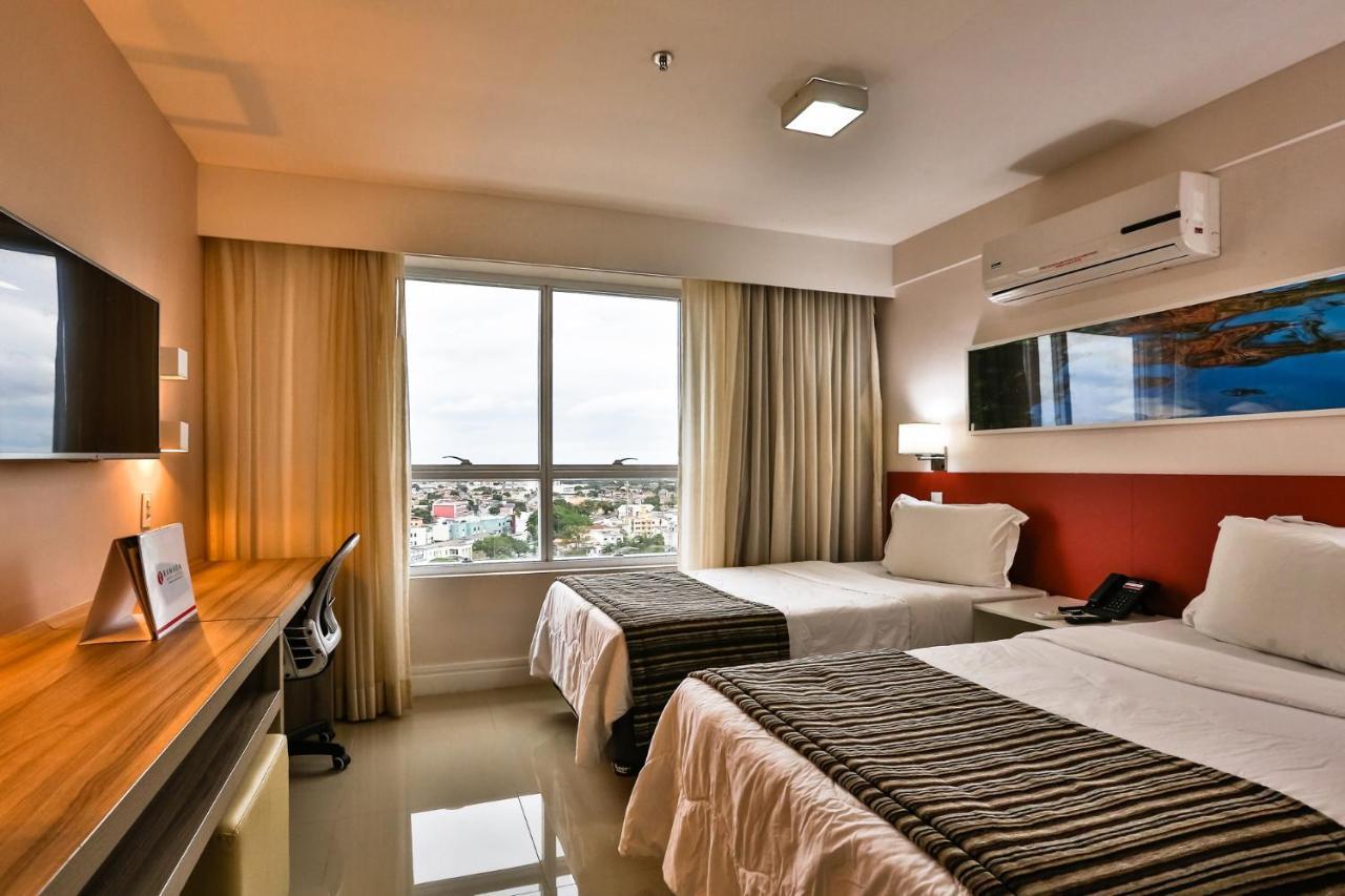 Ramada Hotel & Suites Campos Pelinca Кампус-дус-Гойтаказис Экстерьер фото