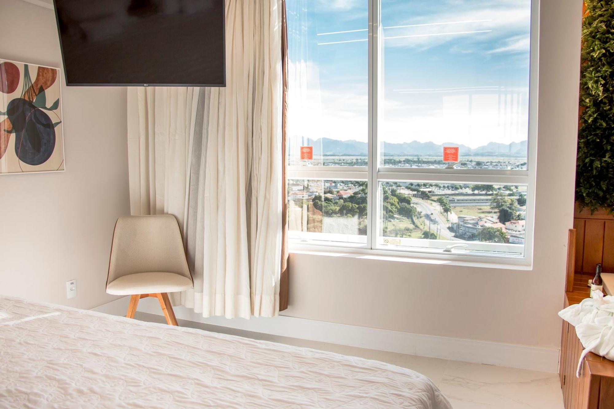 Ramada Hotel & Suites Campos Pelinca Кампус-дус-Гойтаказис Экстерьер фото